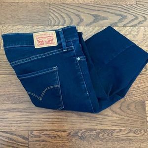 Levi’s 312 mid-rise jeans.